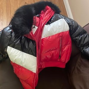 Red , blk and white kids puffy coat. Brand new! Size 10.